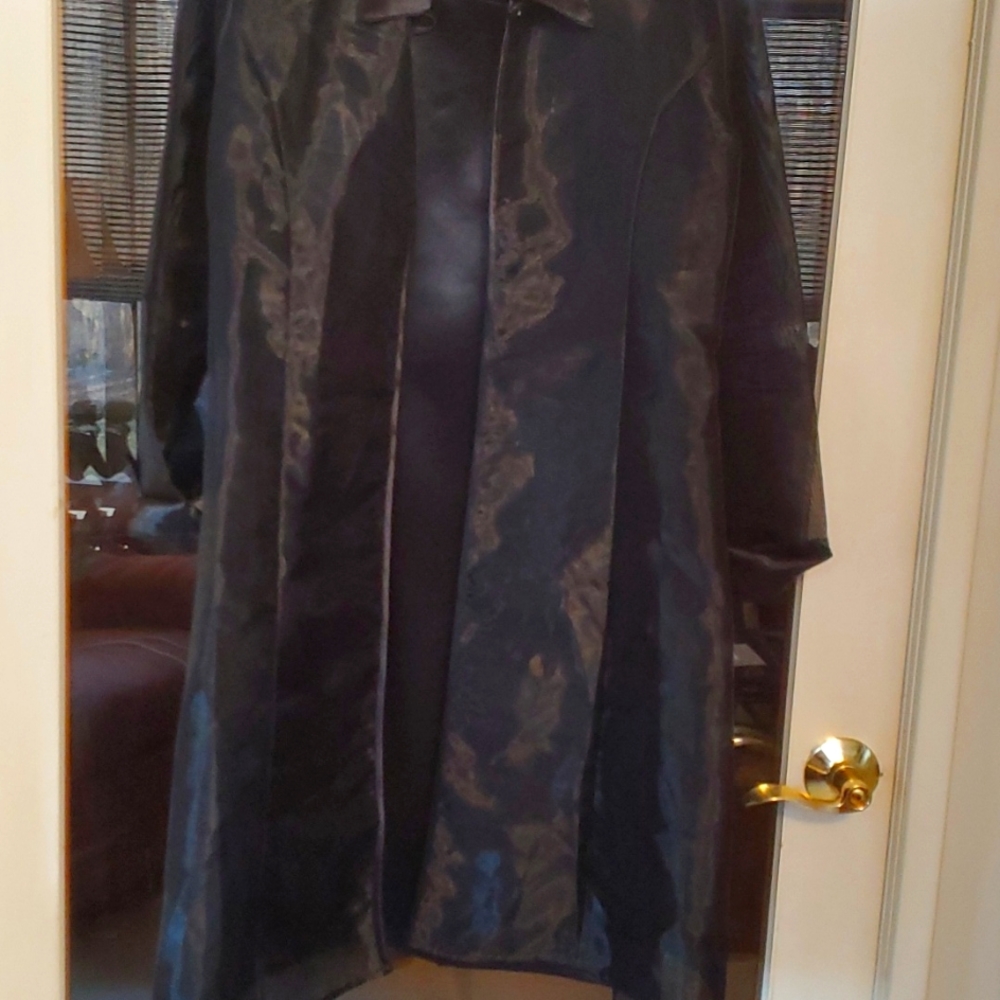 Lady's A-line black dress with matching long jacket.